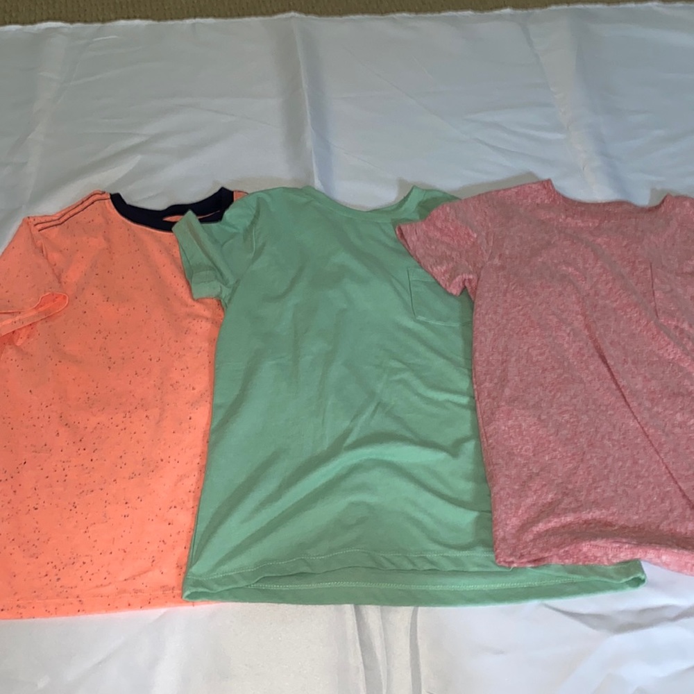 Three boy’s Gymboree pocketed t shirts